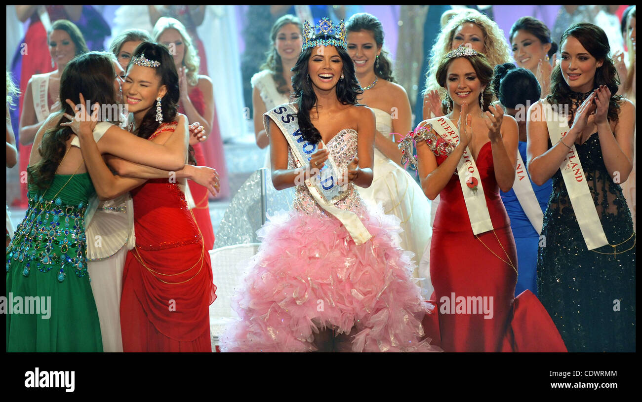 Nov. 6, 2011 - London, United Kingdom - Miss Venezuela Ivian Lunasol Sarcos Colmenares wins  the 2011 Miss World final at Earls Court London, with Gwendoline Ruais from the Philippines (left, red dress) and 3rd place Amanda Perez from Puerto Rico (right red dress), Sunday November 6, 2011. Photo By  Stock Photo