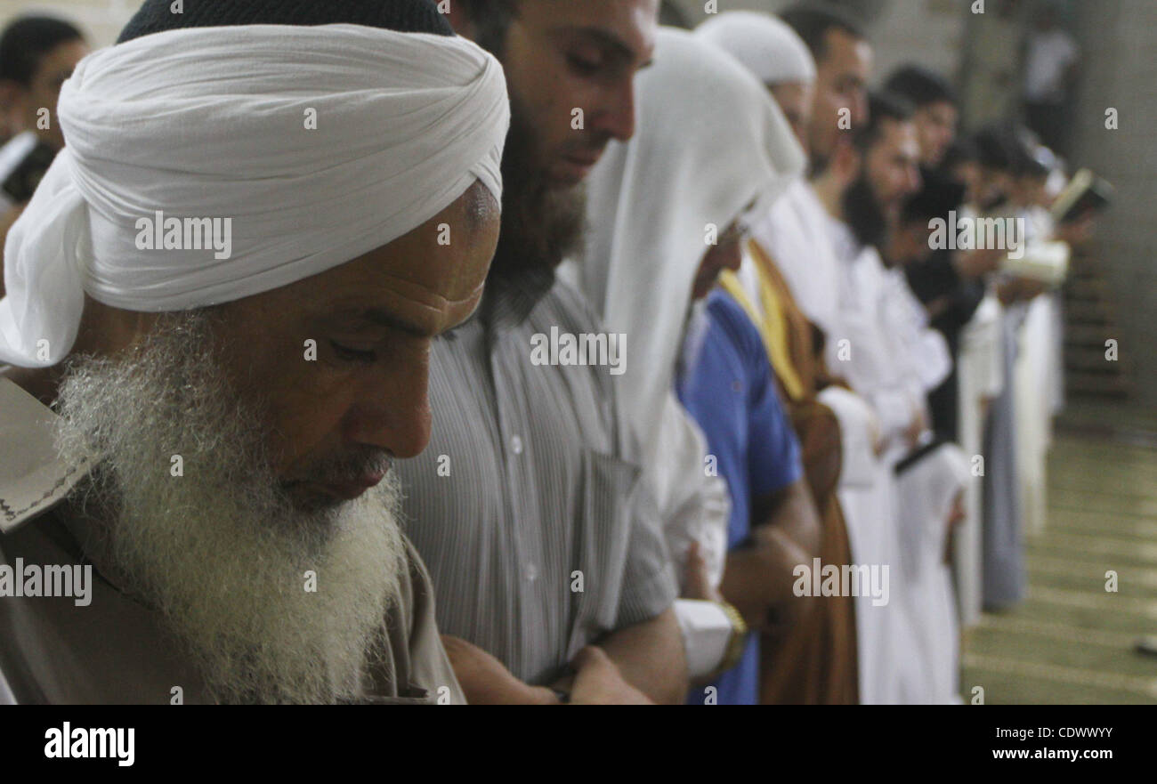 Palestinian Muslim worshippers pray during Laylat Al Qadr prayers on