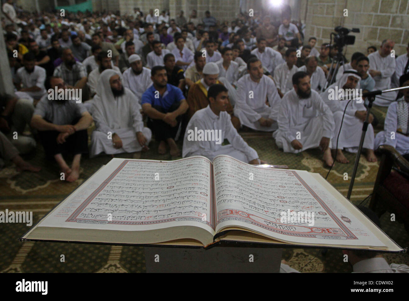 Palestinian Muslim worshippers pray during Laylat Al Qadr prayers on