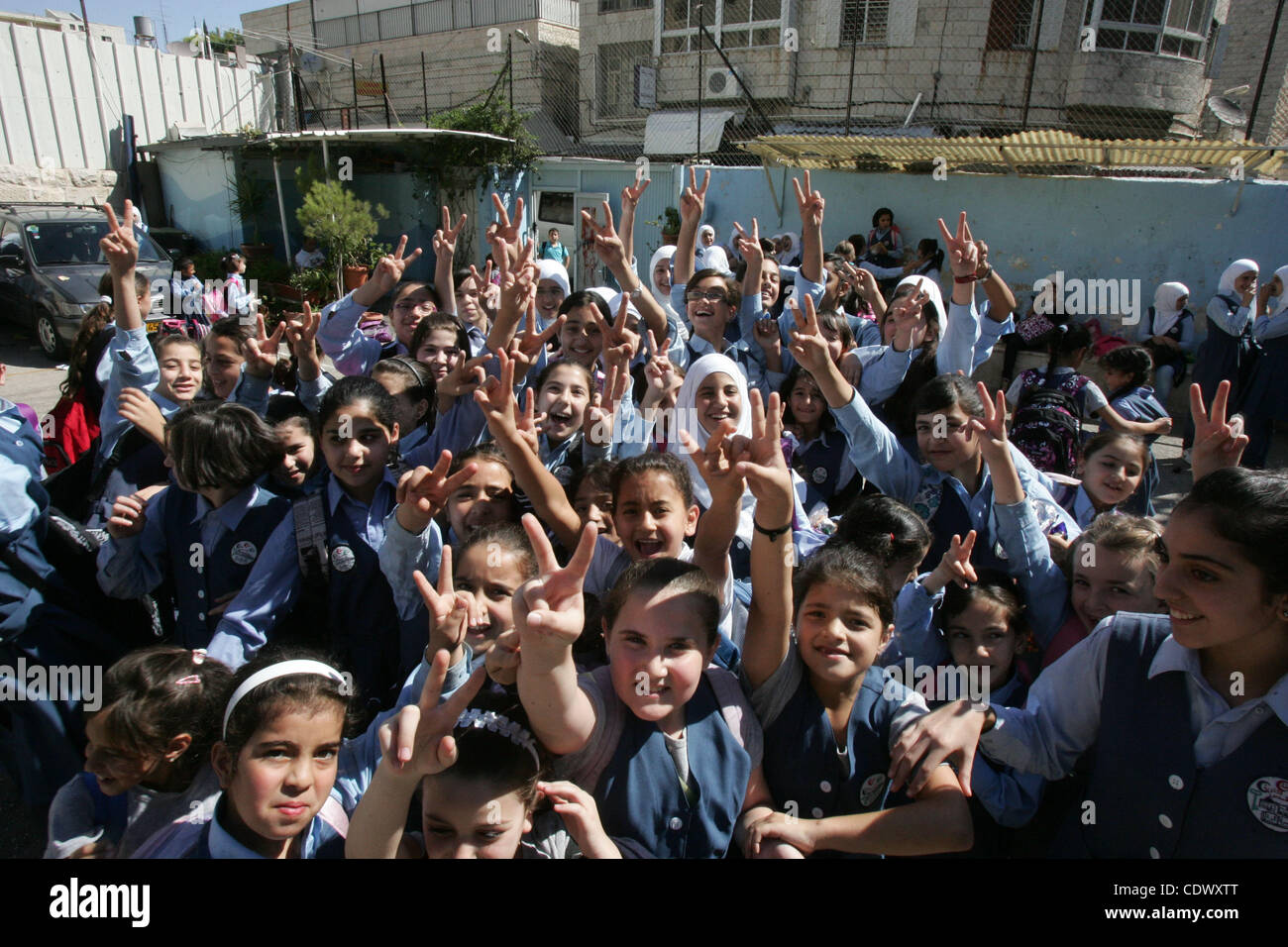 Palestinian students participate in a strike against the Palestinian