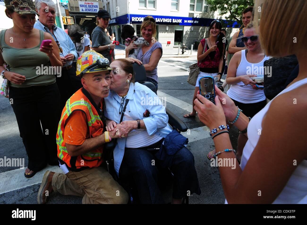 Aug. 17, 2011 Manhattan, New York, U.S. GARY RUSSO gets a kiss from