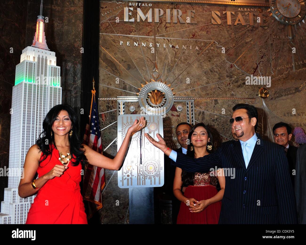 Aug. 19, 2011 - Manhattan, New York, U.S. - Actresses RANI MUKHERJEE and RESHMA SHETTY with actor GULSHAN GROVER as Bollywood and Hollywood stars light the Empire State Building in the color of the Indian flag in honor of the 31st New York City FIA India Day Parade. (Credit Image: © Bryan Smith/ZUMA Stock Photo