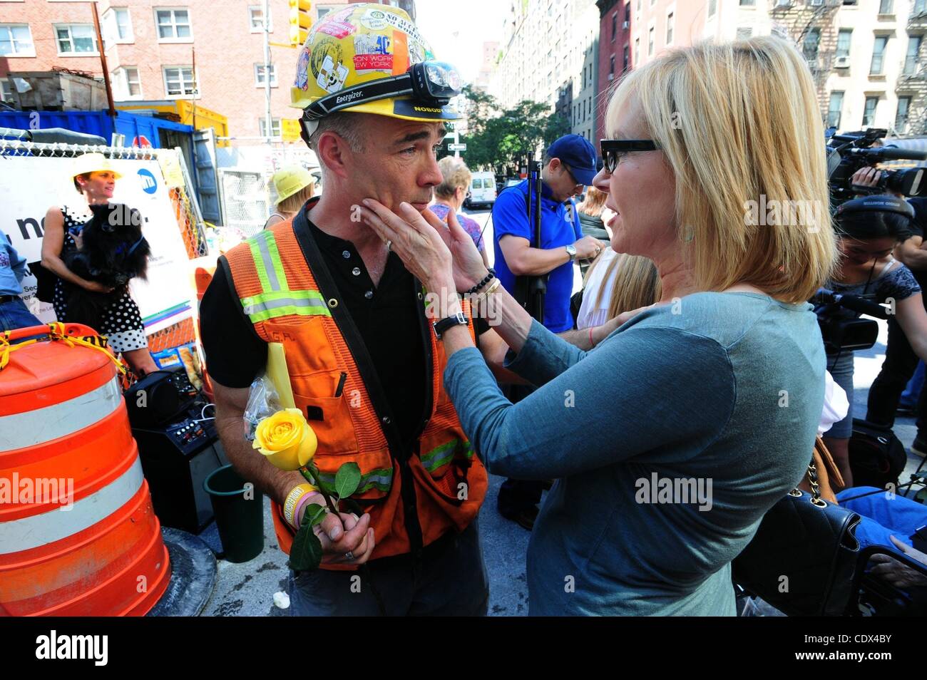 Sept. 1, 2011 Manhattan, New York, U.S. GARY RUSSO is embraced by