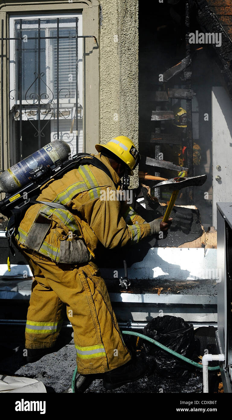 OCT 31,2011 - HOLLYWOOD, California, USA. Los Angeles city firefighters battle a fire at the famous Magic Castle in Hollywood CA. The fire started on the third floor were workers were doing some repairs and a fire started and got into the attic of the offices. The fire was knockdown in and one hour  Stock Photo