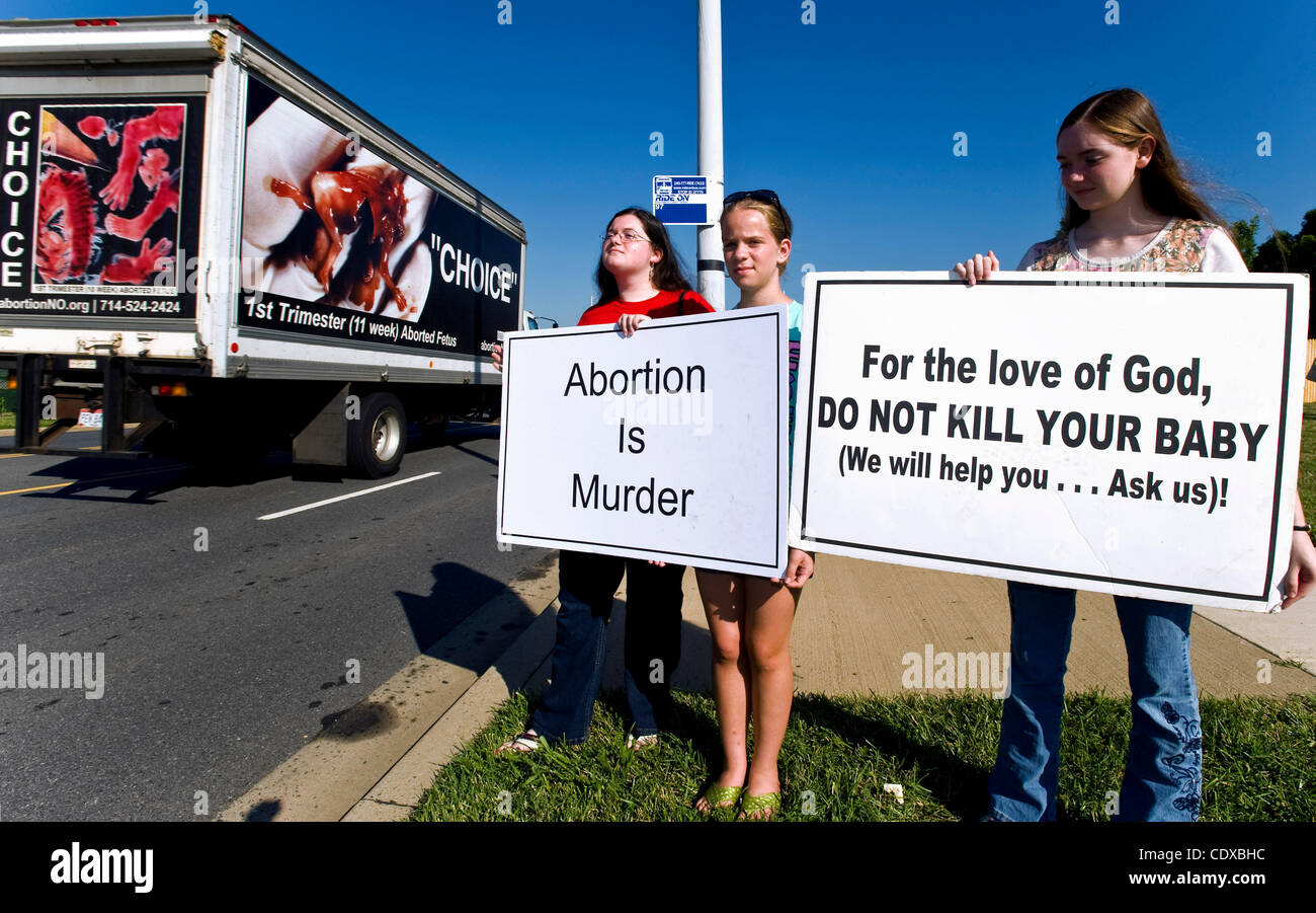Aug 02, 2011 - Germantown, Maryland, USA -  Several dozen anti-abortion activists participate in their annual, nine-day 'Summer of Mercy' street rally and prayer vigil across the street from the Reproductive Health Services clinic, where Dr. LeRoy Carhart continues to provide abortion services despi Stock Photo