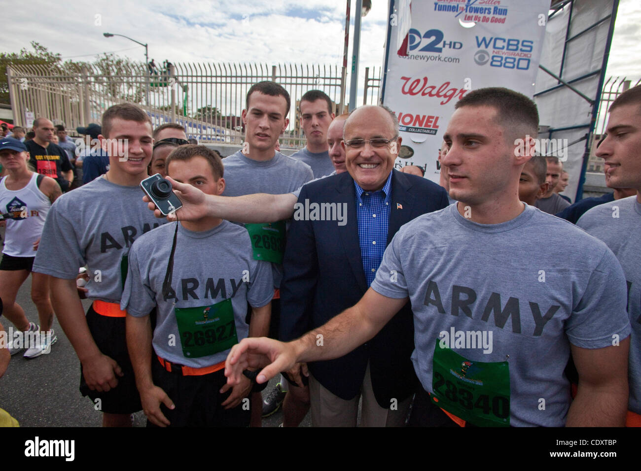 Sept. 25, 2011, New York, New York, U.S. - RUDY GIULIANI, mayor of New York during the Sept. 11 Twin towers attack, stands with West Point Army cadets posing for pictures.  Thousands of relatives and friends of World Trade Center terror attack victims participated in the annual five-kilometer event  Stock Photo