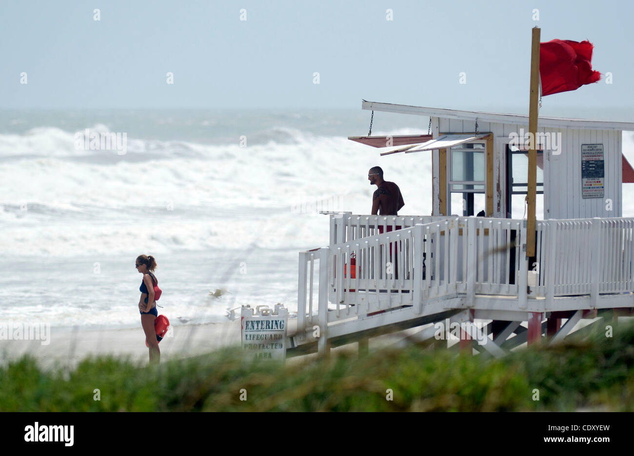 Aug. 25, 2011 Cocoa Beach, Florida, U.S. Lifeguards watch swimmers