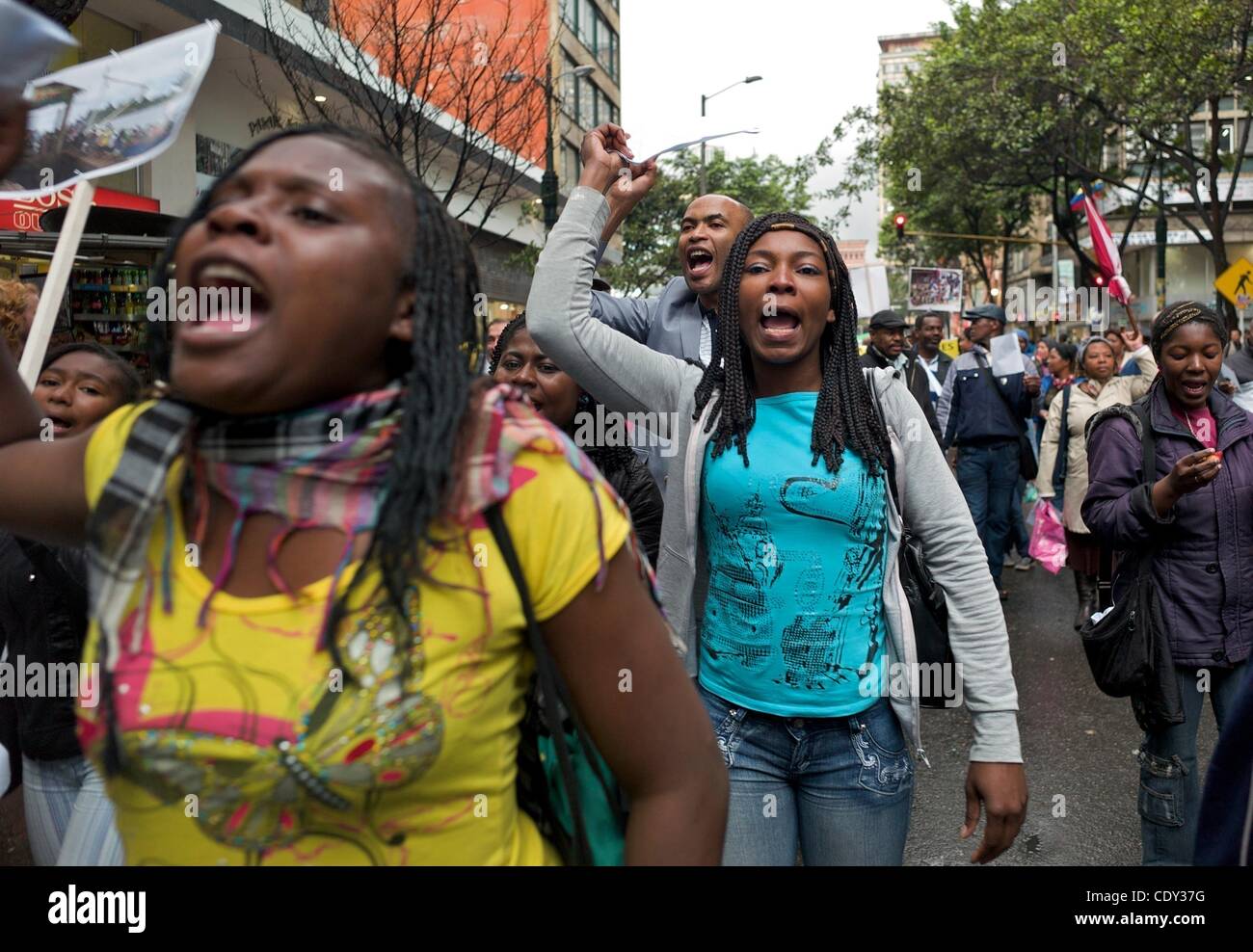 Oct. 12, 2011 - Bogota, Colombia - Afro-Colombians march in protest against the Free Trade Agreement with the U.S., which was approved by Congress late Wednesday. The National Association for Internally Displaced Afro-Colombians (AFRODES) organized the march. AFRODES opposes the FTA because it belie Stock Photo