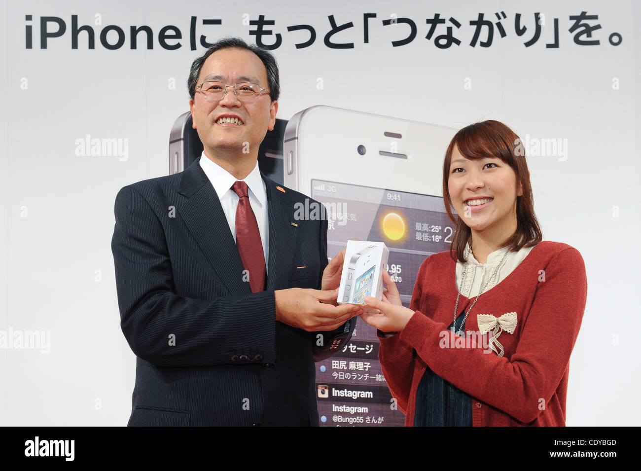 Oct. 14, 2011 - Tokyo, Japan - KDDI Corporation President TAKASHI TANAKA attends the launch event of the Apple Inc. iPhone 4S at the the KDDI's shop in Tokyo, Japan. iPhone 4S will be released simultaneously in 7 countries. iPhone 4S will be sold by Softbank and AU, 2 carriers for the first time in  Stock Photo