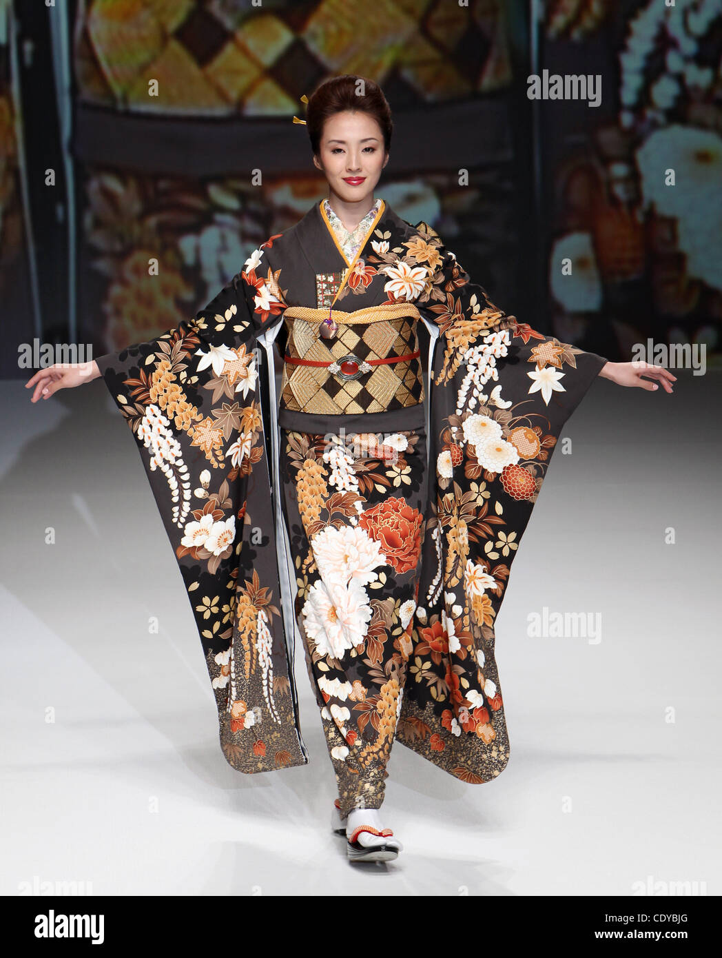 Oct. 17, 2011 - Tokyo, Japan - Model displays the collection of YUKIKO ...