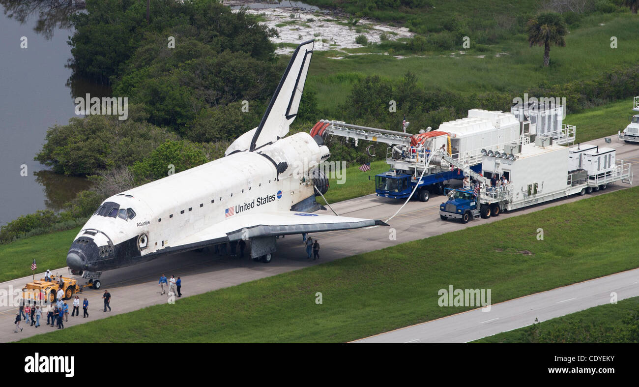Cape Canaveral, Florida US - Space shuttle Atlantis is towed from the Shuttle Landing Facility back to Orbiter Processing Facility 2 after landing just before dawn on July 21, 2011.    (Joel Kowsky/ZUMA) Stock Photo