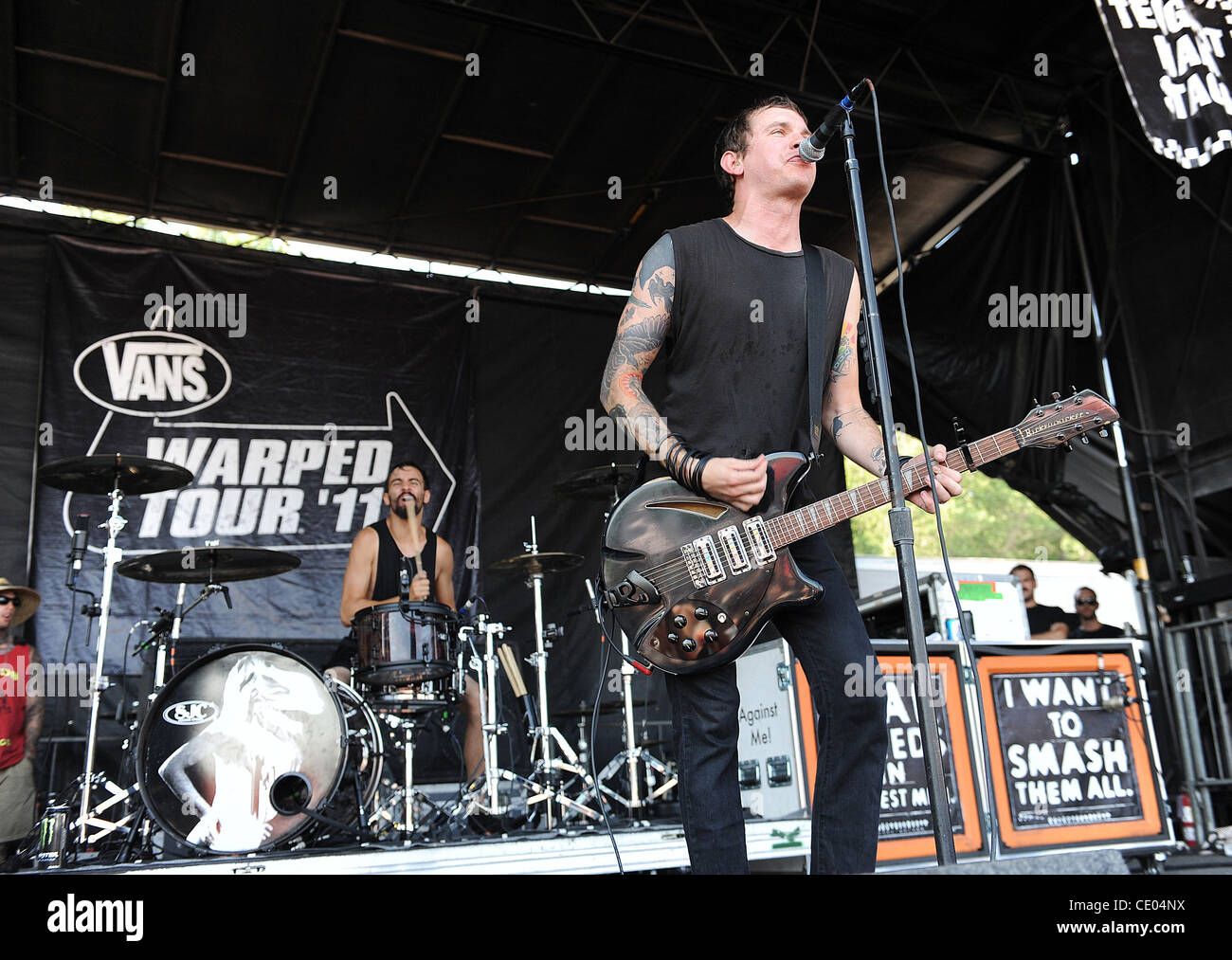 Jul 27, 2011 - Virginia Beach, Virginia; USA - Drummer JAY WEINBERG and  Singer / Guitarist TOM GABEL of the band Against Me! performs live as part  of the 2011 Vans Warped