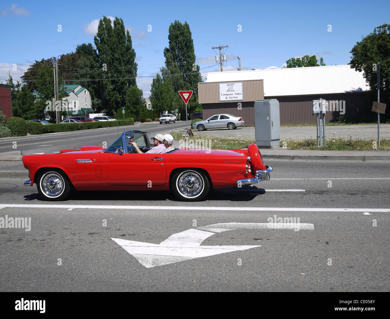 July 31, 2011 - New York, New York, U.S. - Couple in red car in McMinnville, Oregon. (Credit Image: © John Marshall Mantel/ZUMAPRESS.com) Stock Photo