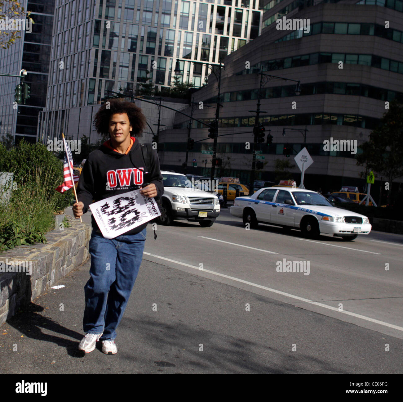 Occupy Wall Street protesters march to the offices of the massive financial firm Goldman Sachs who they say should be put on trial for fraud and corruption related to housing foreclosures, pension losses, and student debt. Stock Photo