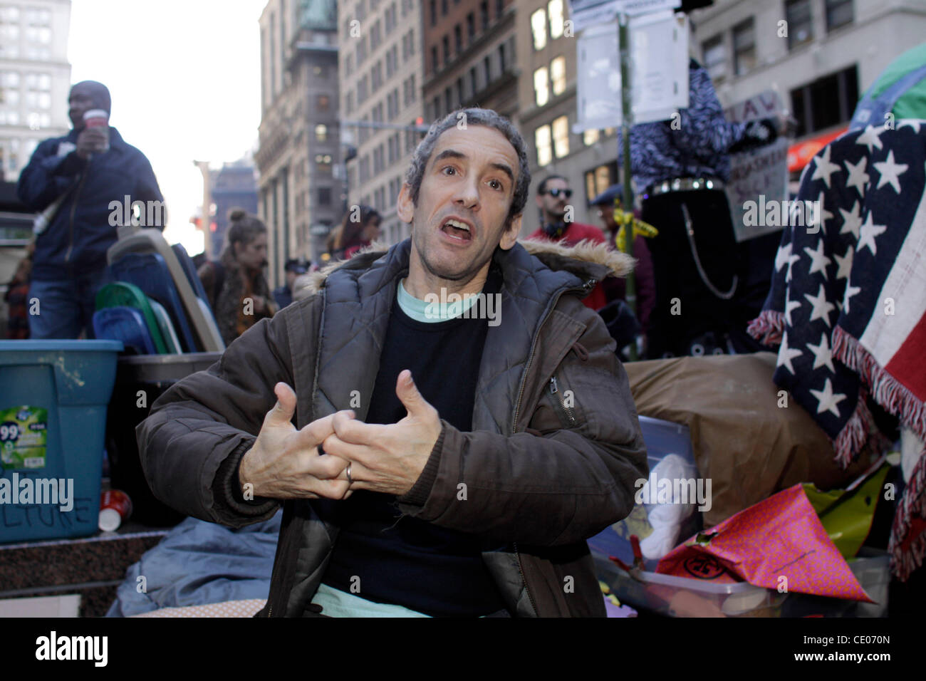 Author and teacher DOUGLAS RUSHKOFF speaks at Occupy Wall Street in Zuccotti Park. Rushkoff focuses on the ways people, cultures, and institutions create, share, and influence each other's values. He teaches media studies at NYU and the New School University, serves as technology columnist for The D Stock Photo