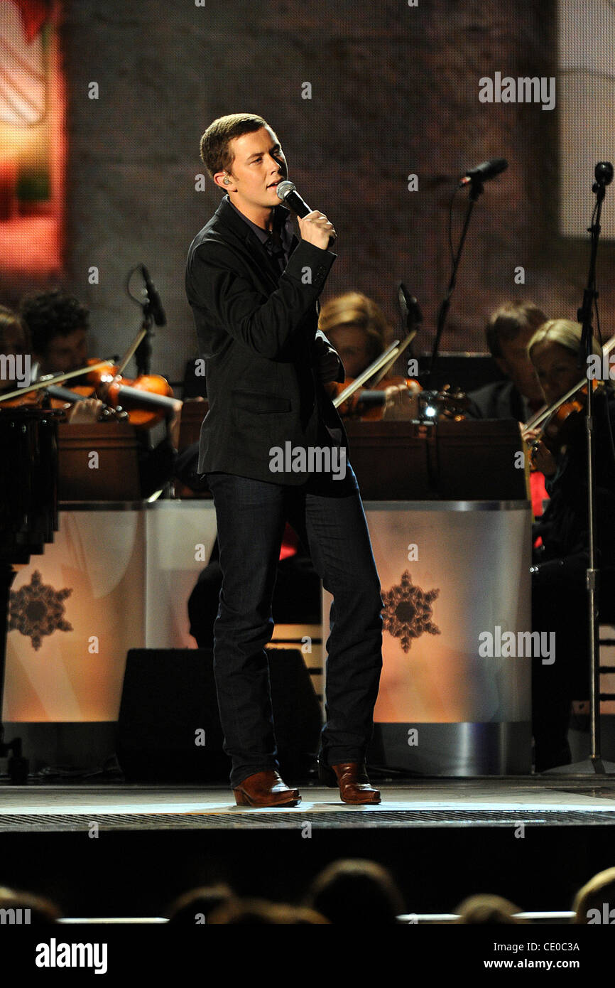 Nov 10, 2011 - Nashville, Tennessee; USA - Singer SCOTTY MCCREERY performs as part of the 2011 CMA Country Christmas Special television taping that took place at the Bridgestone Arena located in downtown Nashville.  Copyright 2011 Jason Moore. (Credit Image: © Jason Moore/ZUMAPRESS.com) Stock Photo