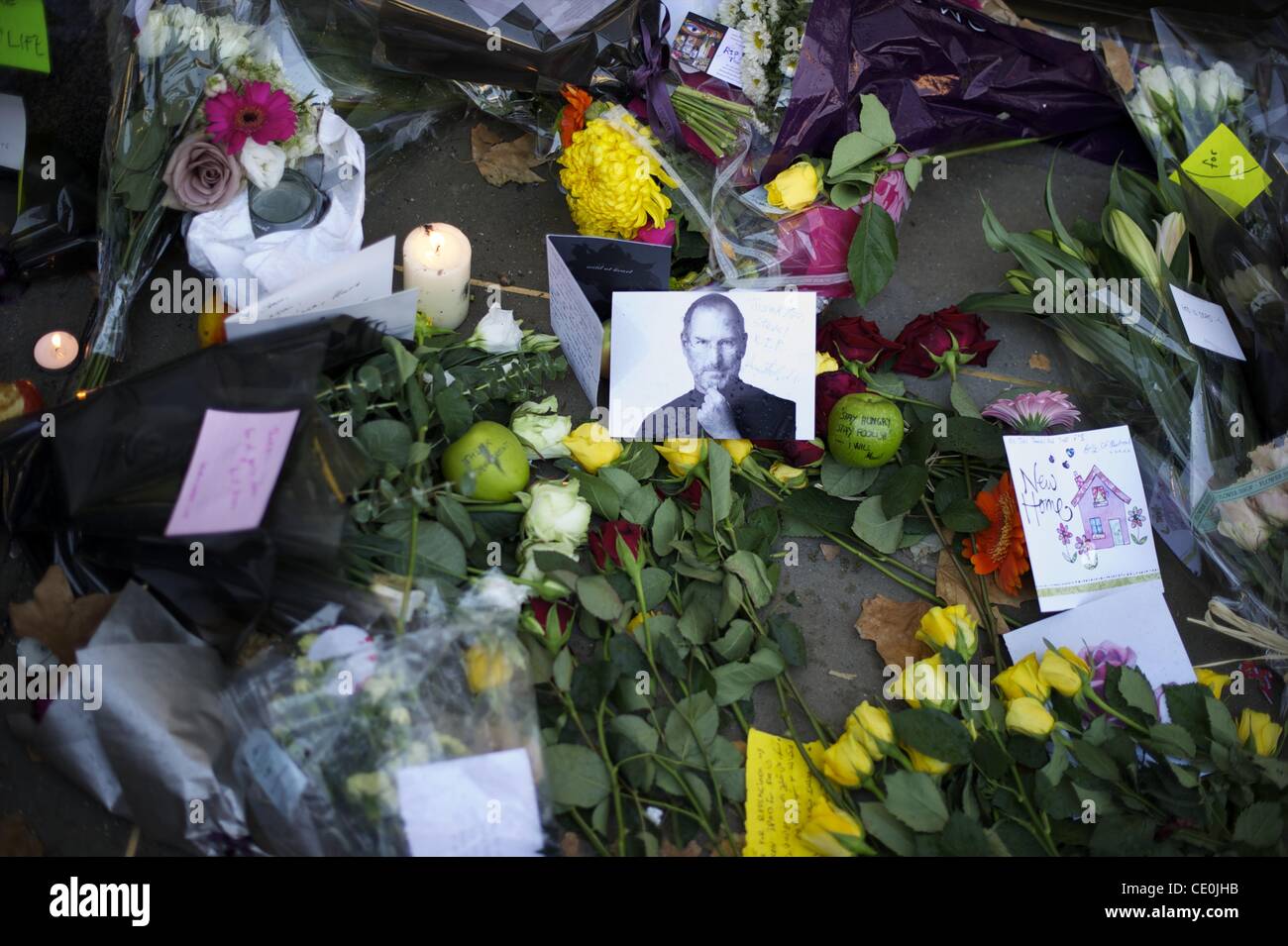 Oct. 6, 2011 - London, England, UK - A memorial for visionary Apple CEO and co-founder STEVE JOBS is created outside the London Regent Street Apple store. (Credit Image: © Mark Makela/ZUMAPRESS.com) Stock Photo