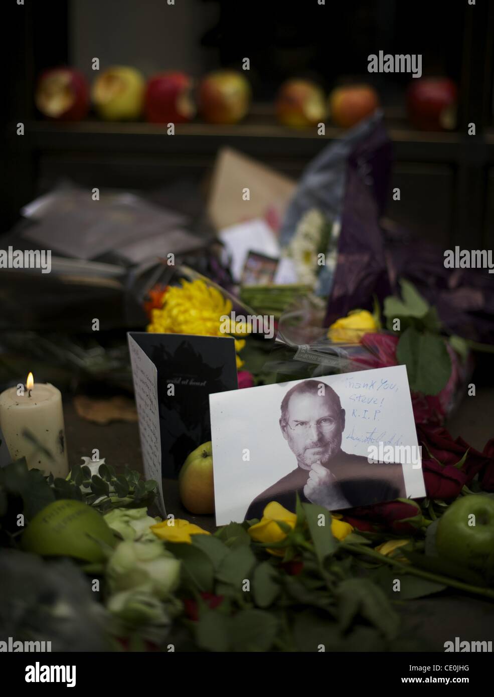 Oct. 6, 2011 - London, England, UK - A memorial for visionary Apple CEO and co-founder STEVE JOBS is created outside the London Regent Street Apple store. (Credit Image: © Mark Makela/ZUMAPRESS.com) Stock Photo