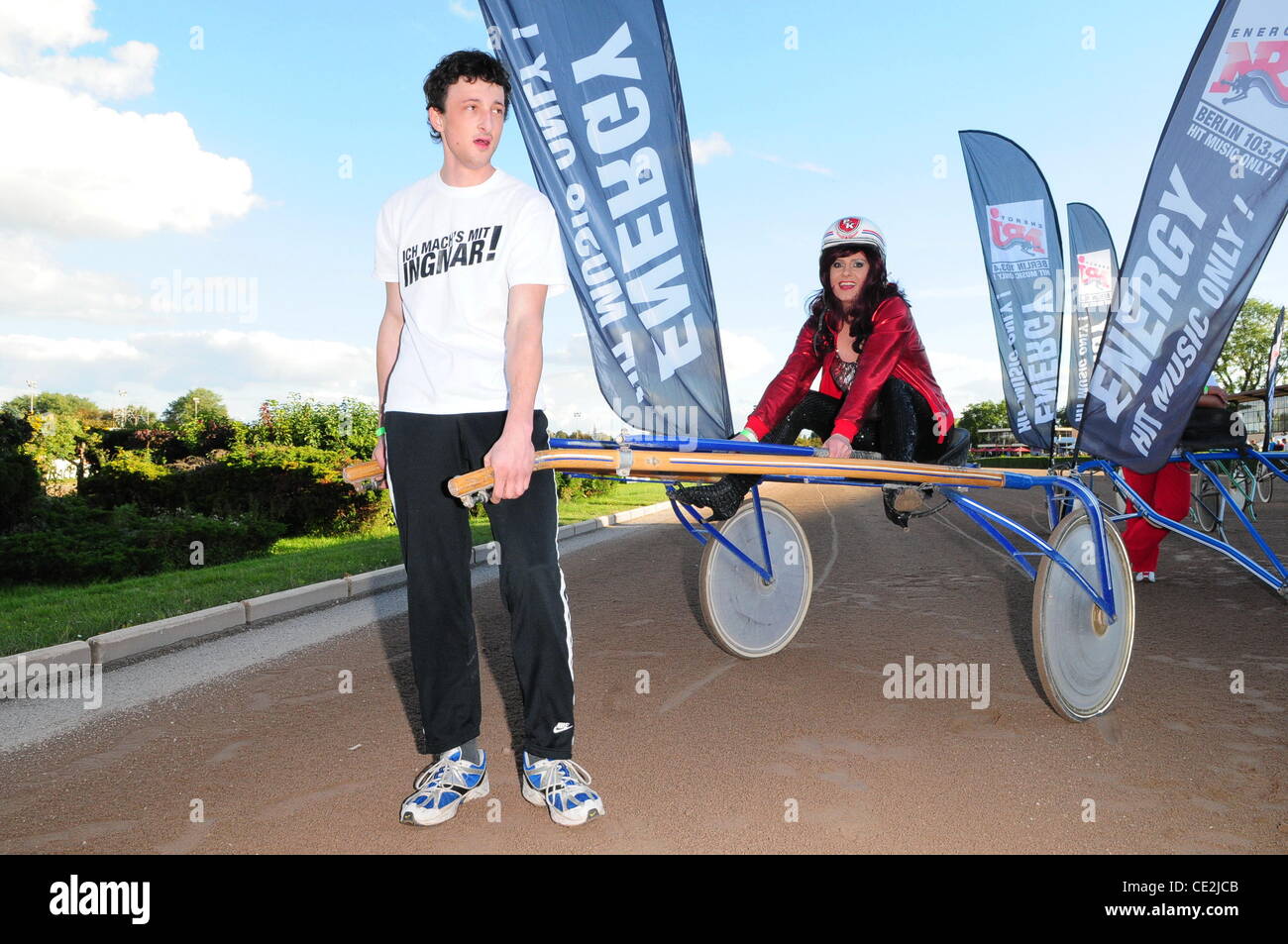 Nina Queer at a Radio Energy Berlin 103.4 competition at Trabrennbahn  Mariendorf race track. Listeners of the Berlin radio station had to pull a  sulky with a celebrity driver in order to