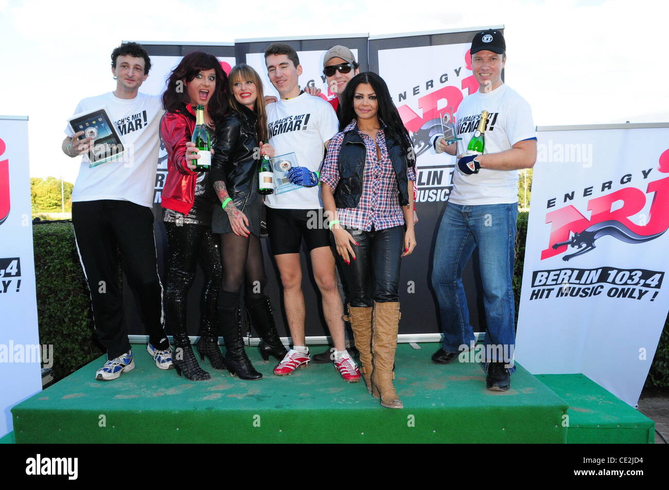 Winner with Nina Queer, Jennifer Rostock, Kader Loth at a Radio Energy  Berlin 103.4 competition at Trabrennbahn Mariendorf race track. Listeners  of the Berlin radio station had to pull a sulky with
