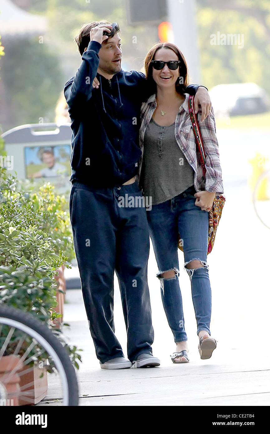 Tobey Maguire and Jennifer Meyer a camera shy Tobey Maguire leaving Le ...