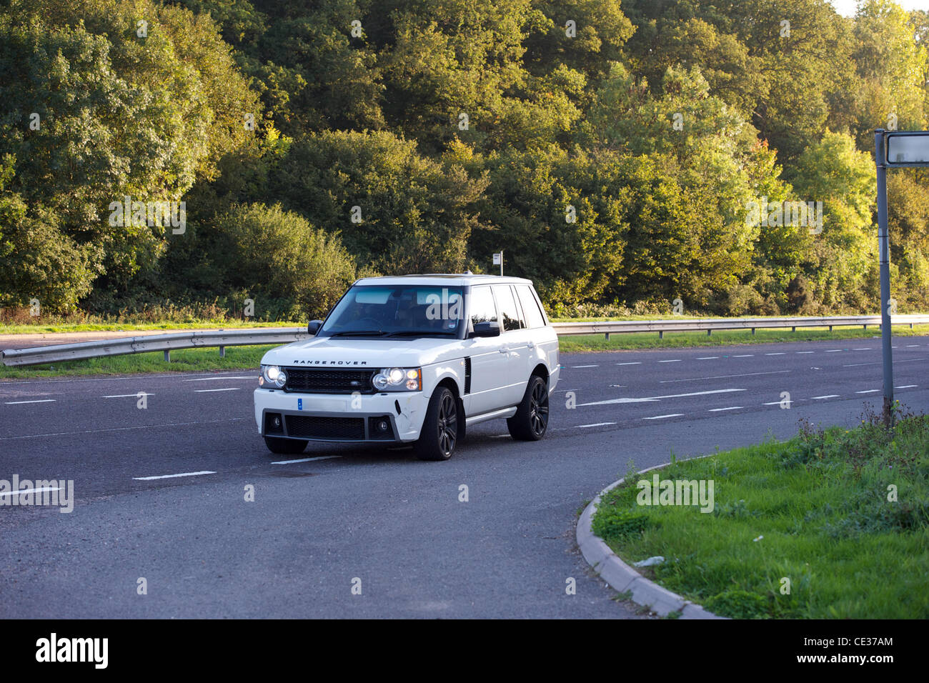 Katie Price aka Jordan out driving near her home. Her Land Rover appears to have a crack in the