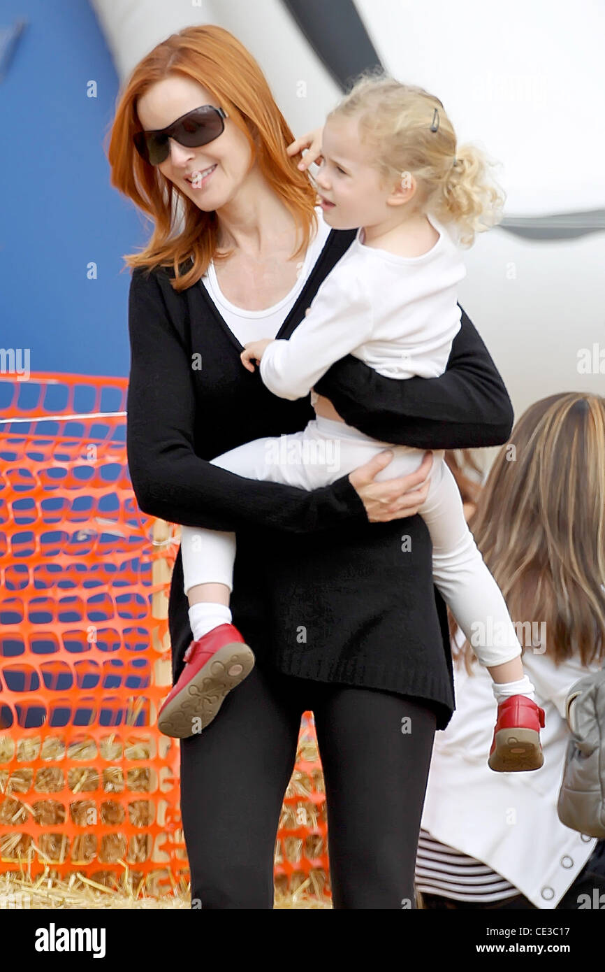 Marcia Cross and Eden Mahoney Marcia Cross takes her twin daughters to ...