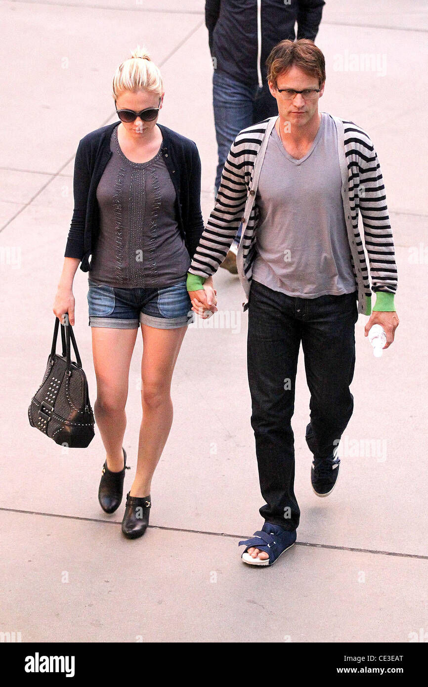 Anna Paquin and Stephen Moyer holding hands as they leave Arclight ...