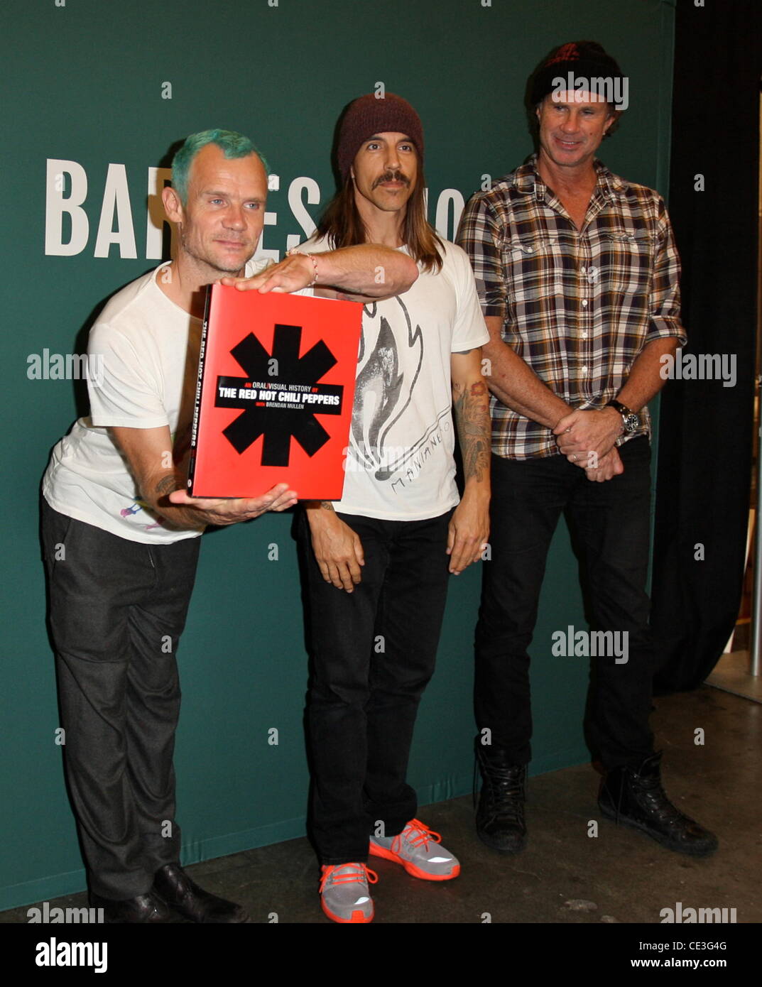 Flea aka Michael Peter Balzary, Anthony Kiedis and Chad Smith Red Hot Chili Peppers promote their new book 'The Red Hot Chili Peppers: An Oral/Visual History' at The Grove in Hollywood Los Angeles, California - 04.11.10 Stock Photo