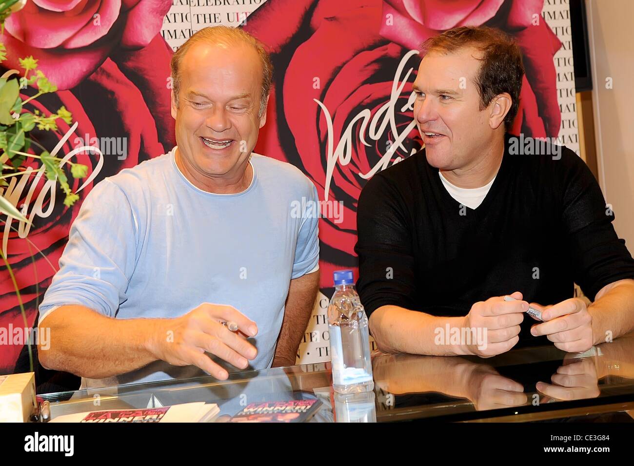 Kelsey Grammer and Douglas Hodge stars of Broadway's 'La Cage aux Folles' sign copies of the musical's cast recording at Lord & Taylor New York City, USA - 04.11.10 Stock Photo