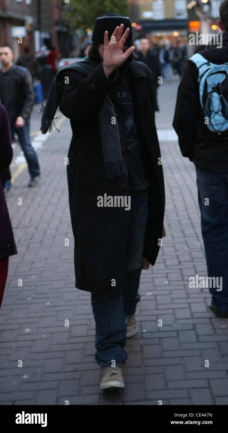 Keanu Reeves is seen shopping at Kiehl's and avoiding the paparazzi while in Covent Garden. London, England - 09.01.11 Stock Photo