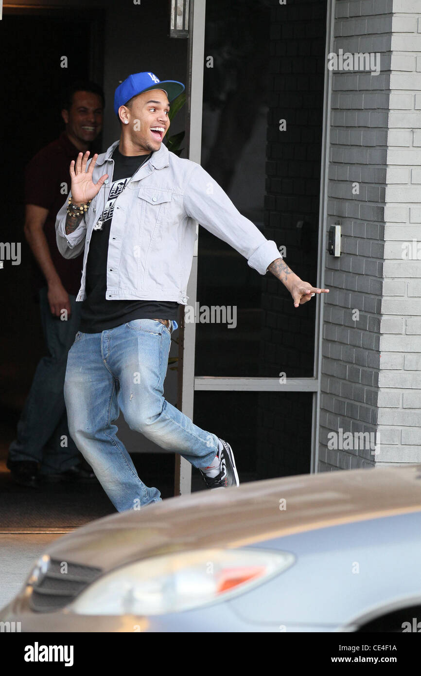 Chris Brown shows off in front of photographers outside a recording studio  in Hollywood. Los Angeles, California - 24.01.11 Stock Photo - Alamy