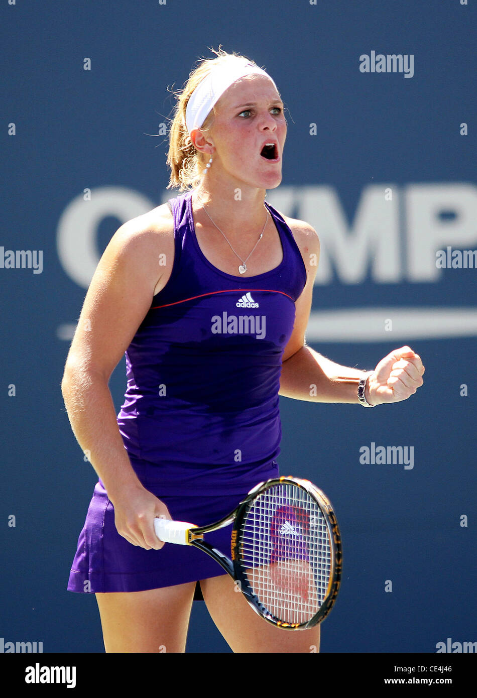 Melanie Oudin of the United States competes against Olga Savchuk of the Ukraine during her first round women's single match on day one of the 2010 U.S. Open at the USTA Billie Jean King National Tennis Center.  Oudin beat Savchuck with a score of 6-3, 6-0 Stock Photo