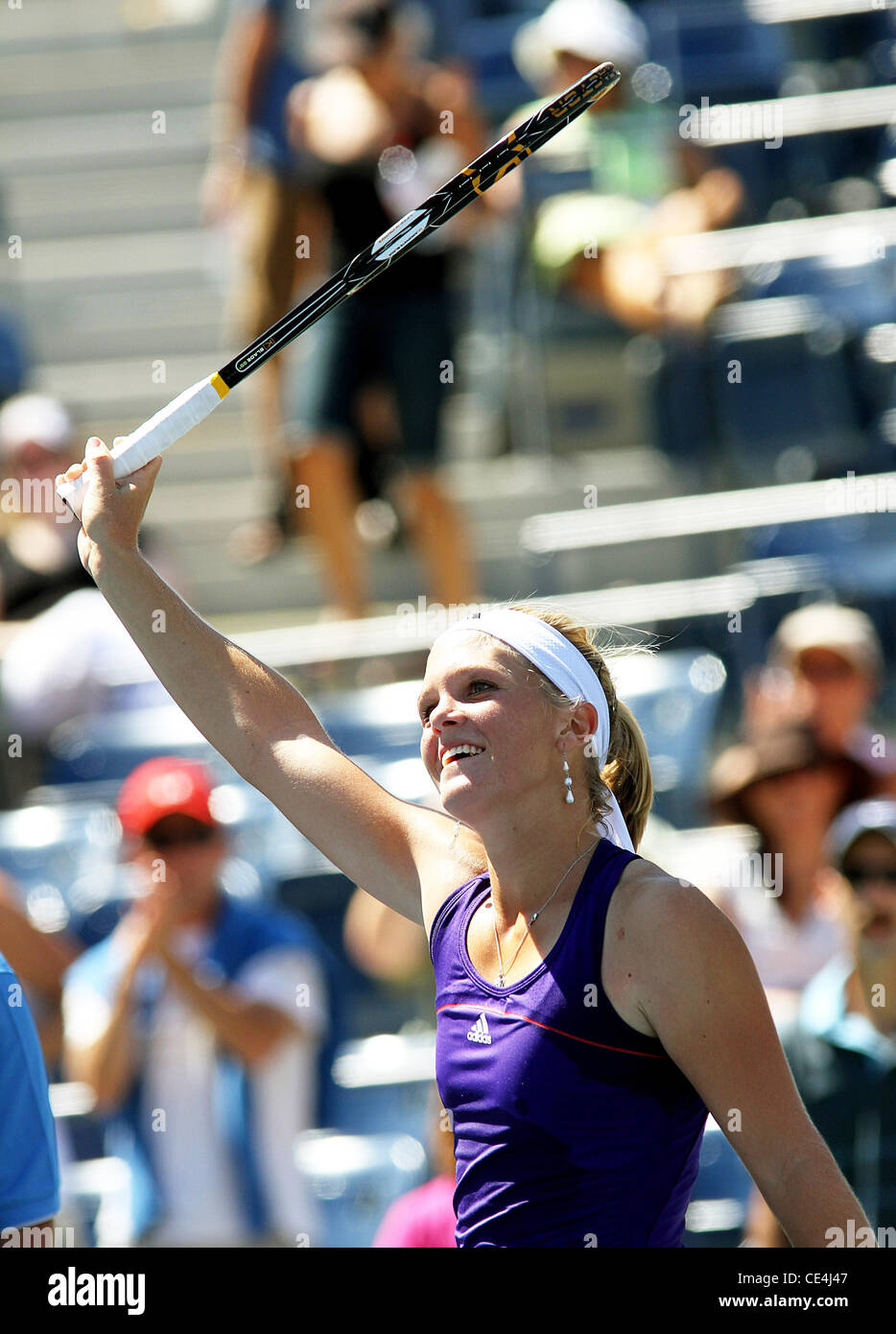 Melanie Oudin of the United States competes against Olga Savchuk of the Ukraine during her first round women's single match on day one of the 2010 U.S. Open at the USTA Billie Jean King National Tennis Center.  Oudin beat Savchuck with a score of 6-3, 6-0 Stock Photo
