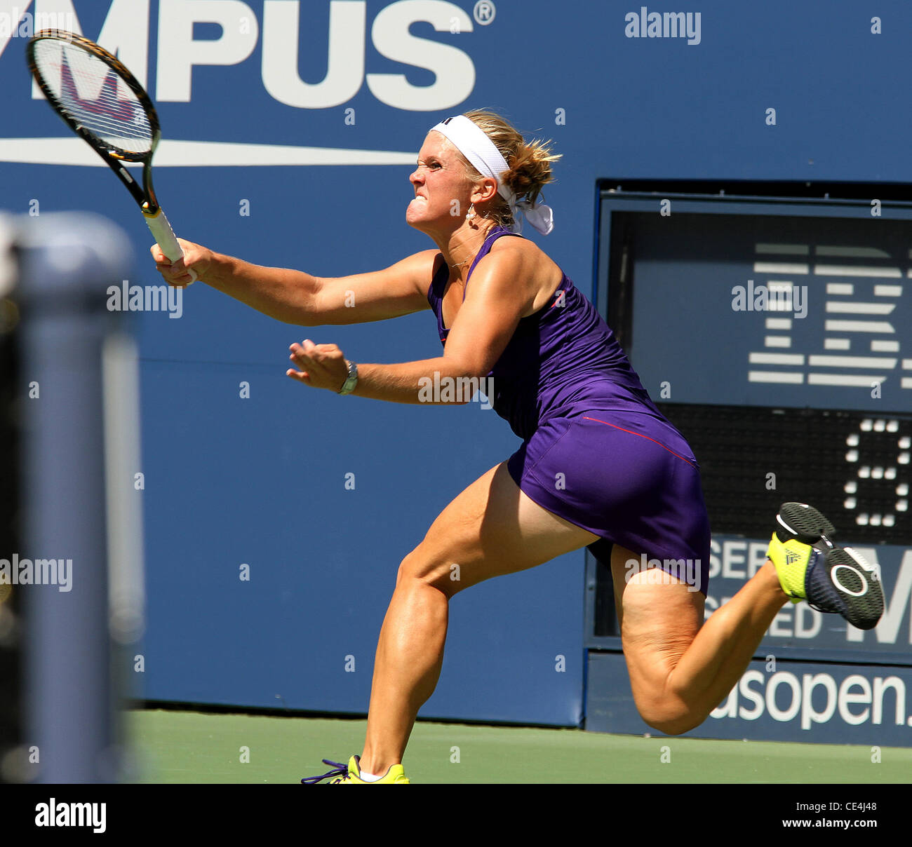 Melanie Oudin of the United States competes against Olga Savchuk of the Ukraine during her first round women's single match on day one of the 2010 U.S. Open at the USTA Billie Jean King National Tennis Center.  Oudin beat Savchuck with a score of 6-3, 6-0 Stock Photo