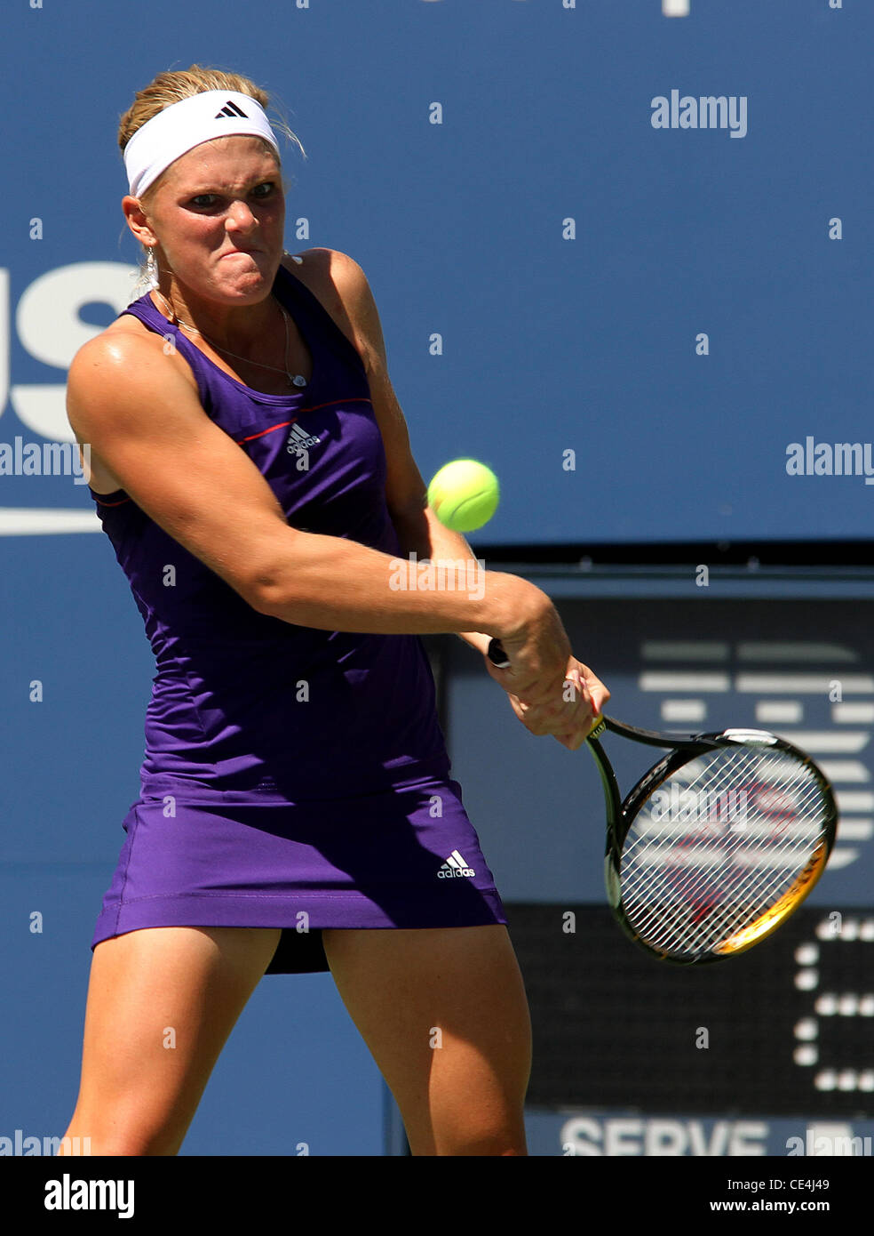 Melanie Oudin of the United States competes against Olga Savchuk of the Ukraine during her first round women's single match on day one of the 2010 U.S. Open at the USTA Billie Jean King National Tennis Center.  Oudin beat Savchuck with a score of 6-3, 6-0 Stock Photo