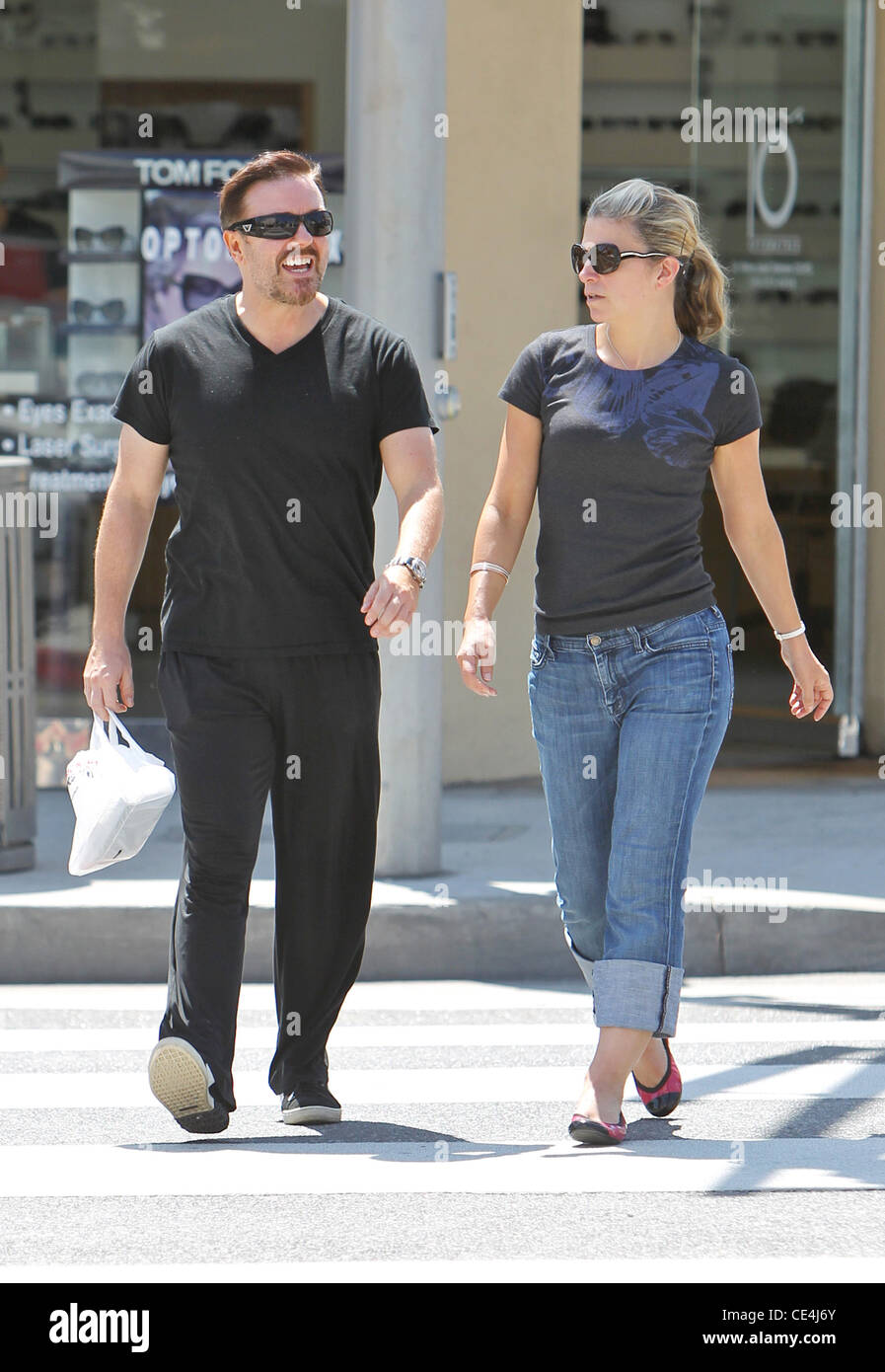 Ricky Gervais and his wife Jane Fallon are seen walking through Beverly