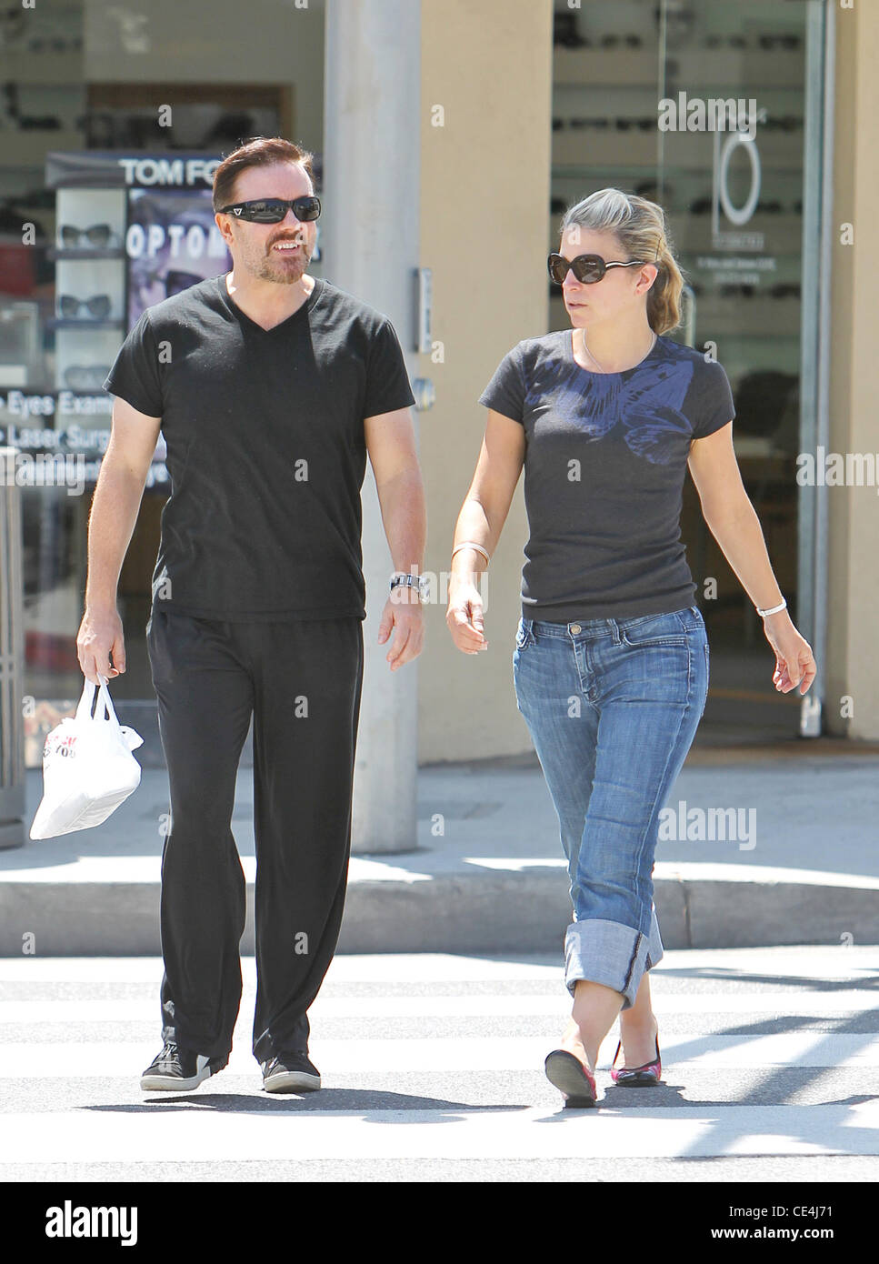 Ricky Gervais and his wife Jane Fallon are seen walking through Beverly
