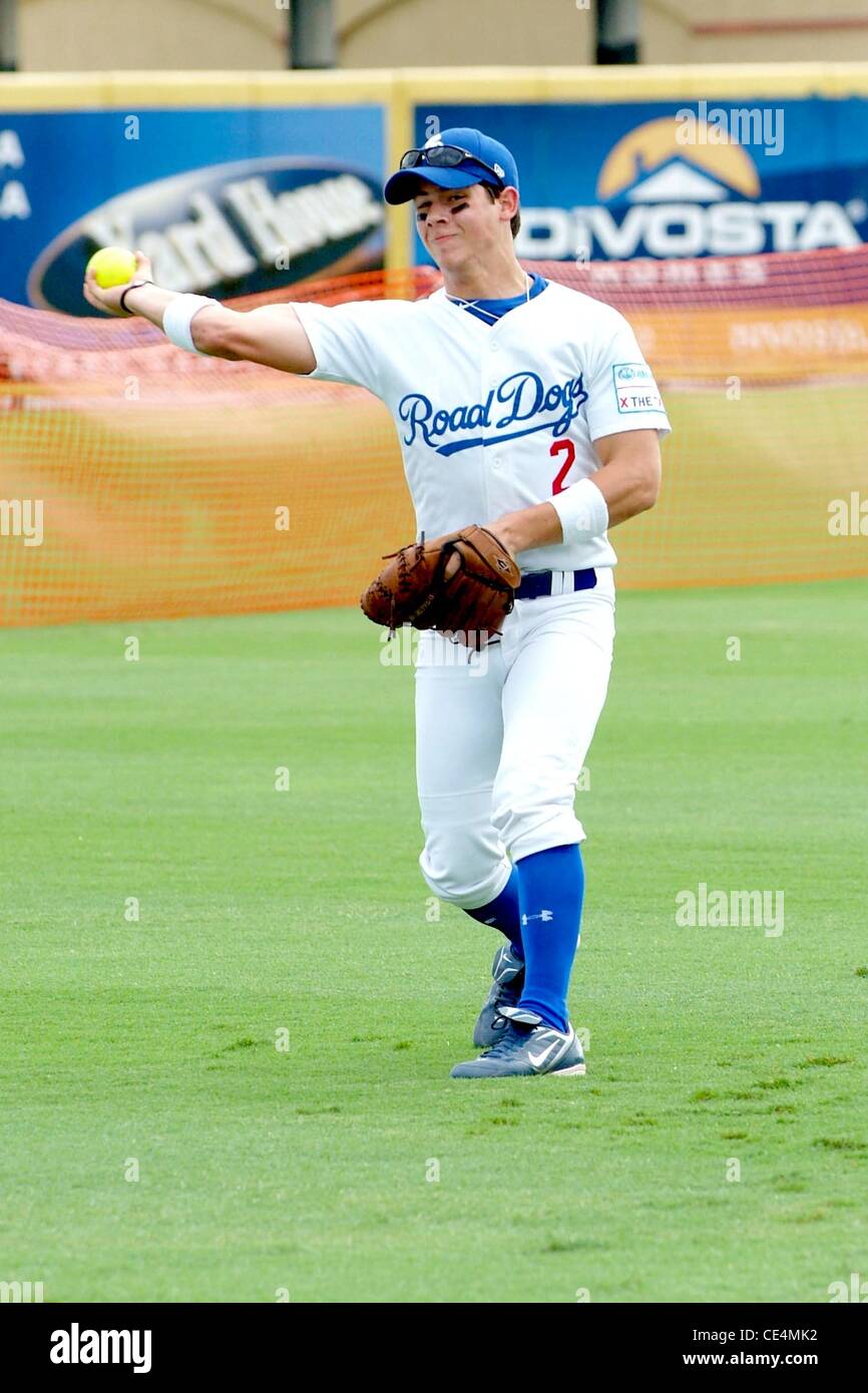 Nick Jonas Jonas Brothers participates in a softball game to encourage teens not to text and drive sponsored by Allstate, held at Roger Dean Stadium Jupiter, Florida - 07.09.10 Stock Photo