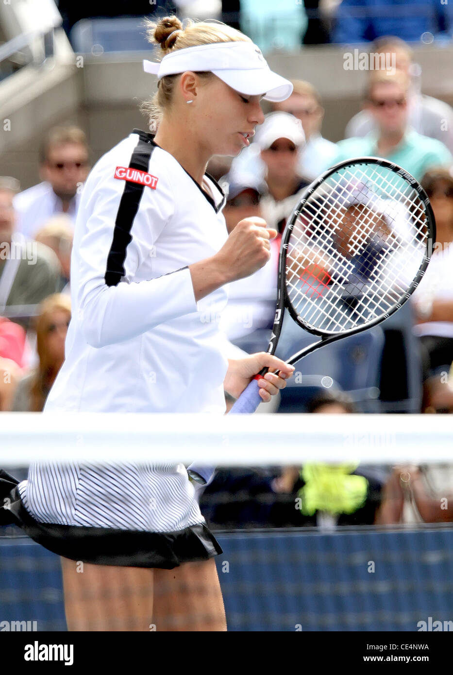 Vera Zvonareva of Russia competes in a women's singles match on Day 12