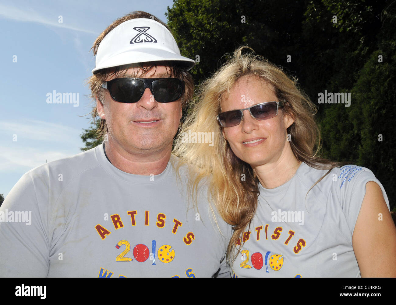 Actors Alec Baldwin and Lori Singer participates in the 62nd Annual