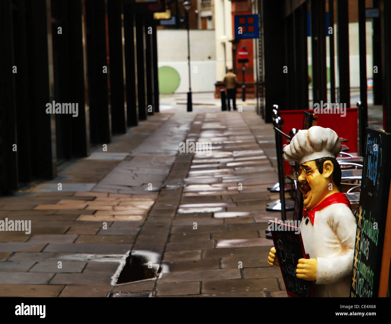 An empty street outside a restaurant in central London Stock Photo