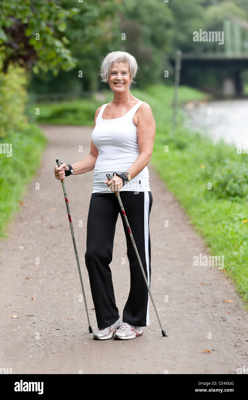 Woman happy relaxed walking hi-res stock photography and images - Alamy