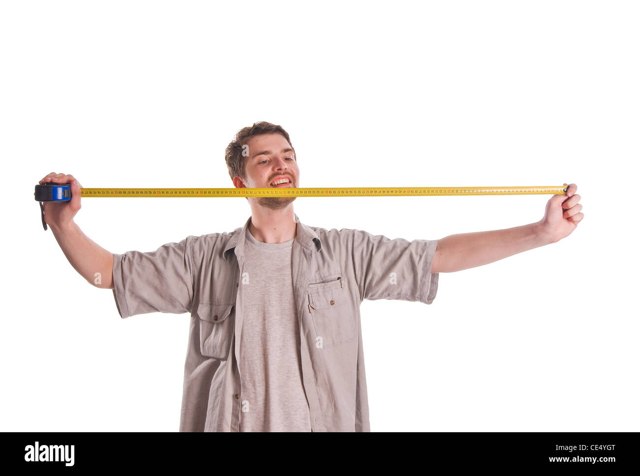 Человек с линейкой. Человек с рулеткой. Человек измеряет рулеткой. Мужчина с рулеткой в руках