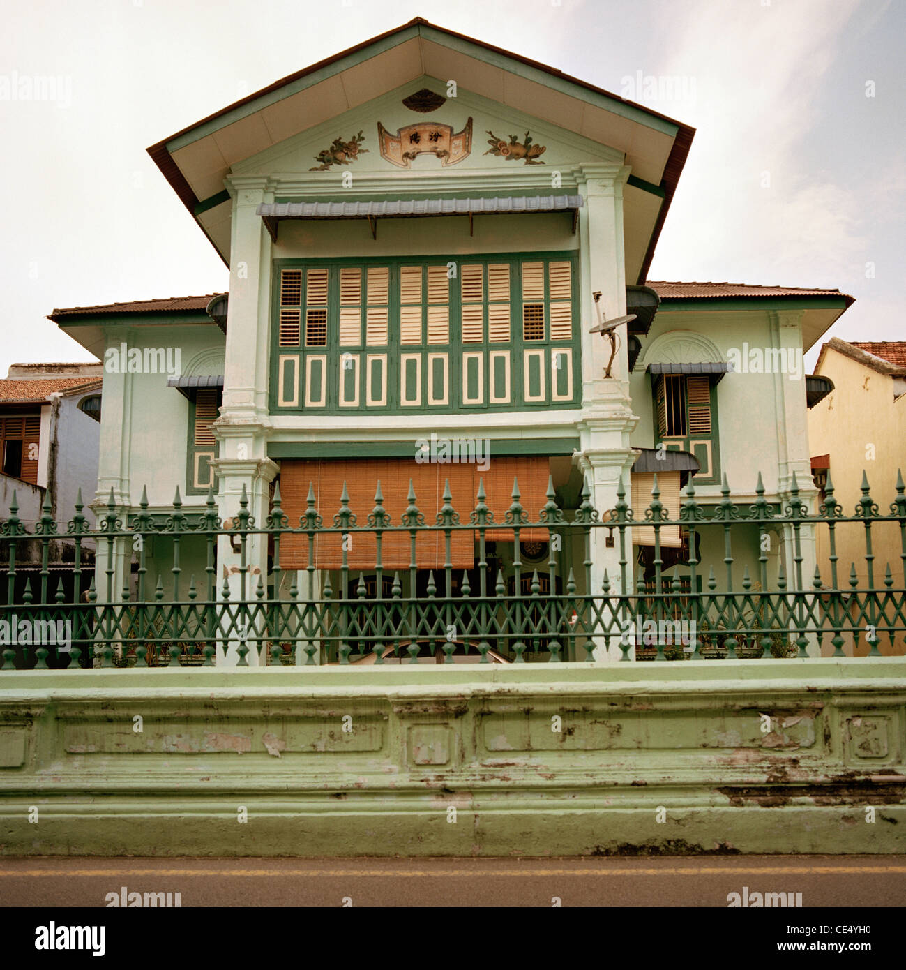 Traditional Peranakan Baba Nonya style architecture house in George Town in Penang Island in Malaysia in Far East Southeast Asia. Building Travel Stock Photo