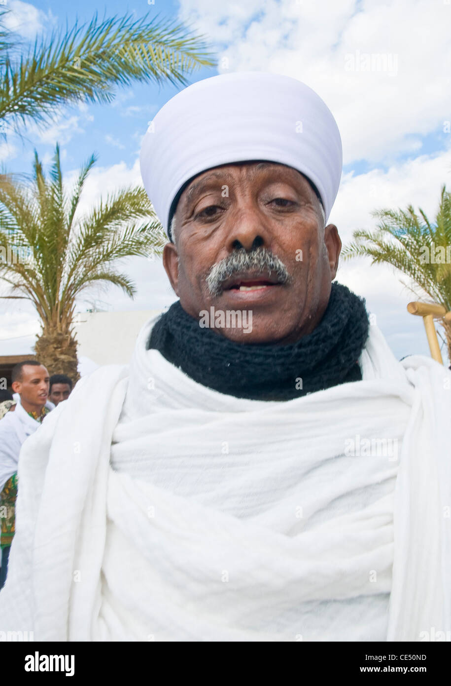 Ethiopian Orthodox priest participates in the annual baptising ceremony