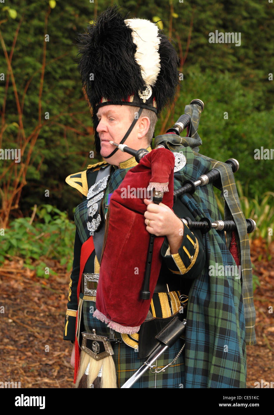 A military piper in full highland dress Stock Photo