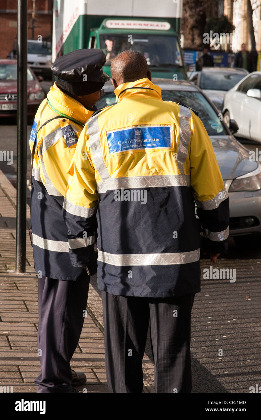 Two City of Westminster traffic wardens, London, UK Stock Photo
