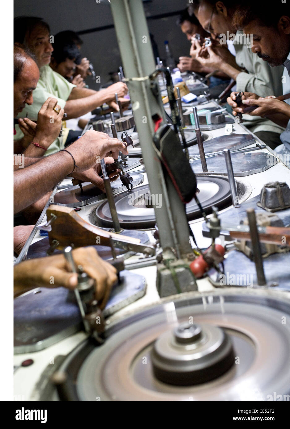 Diamond polishing . Table area and workers where the table [top] , the