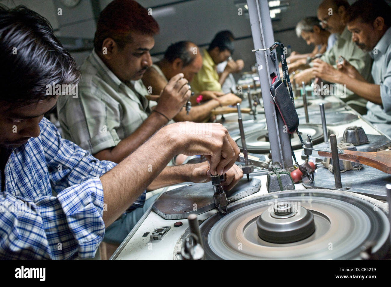 Diamond polishing . Table area and workers where the table [top] , the